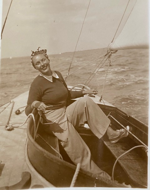 Happy woman in sailing boat